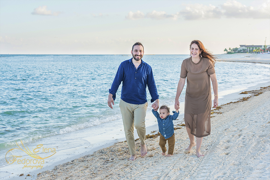 family walking beach cancun