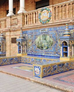 What if I told you that some of the most beautiful stories of Spain aren’t in majestic palaces or museums but hiding in plain sight, on doorways, staircases, and walls?

Traveling and exploring is about noticing little details that create a bigger picture. Walking through the streets of old towns like Marbella’s Casco Antiguo, you’ll notice decorative elements that elegantly add a personal touch to buildings. They appear around doorways, along stair edges, framing balconies, or lining walls. They are so present yet often overlooked, rarely promoted as points of interest. But if you look closely, spotting each tile can feel like a treasure hunt, a little prize hidden in the maze of streets.

These tiles are called azulejos, and they come in countless colorful designs: geometric patterns, floral motifs, or intricate storytelling scenes. When you start paying attention to these small details, a city shifts from being a backdrop to becoming a story. It’s in a chipped azulejo by a doorway, a faded ceramic street sign, or an iron balcony casting patterned shadows in the afternoon light. Big landmarks impress, but small details pull you in. They slow you down, spark curiosity, and make walking the streets feel like a personal discovery. Even the quietest street suddenly feels alive.
Azulejo is the word used in Spain and Portugal for a glazed tile: a terracotta tile covered with an opaque glaze. The word comes from the Arabic al-zillīj, meaning “polished stone.” Its history stretches back to the centuries of Islamic presence on the Iberian Peninsula. Early tiles focused on intricate geometric mosaics, carefully cut and assembled into mesmerizing patterns. Some of the most stunning examples survive at the Alhambra. Read more on my blog, link the Bio. #spain #travel #history #sevilla #marbella