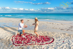 surprise proposal in heart of rose petals